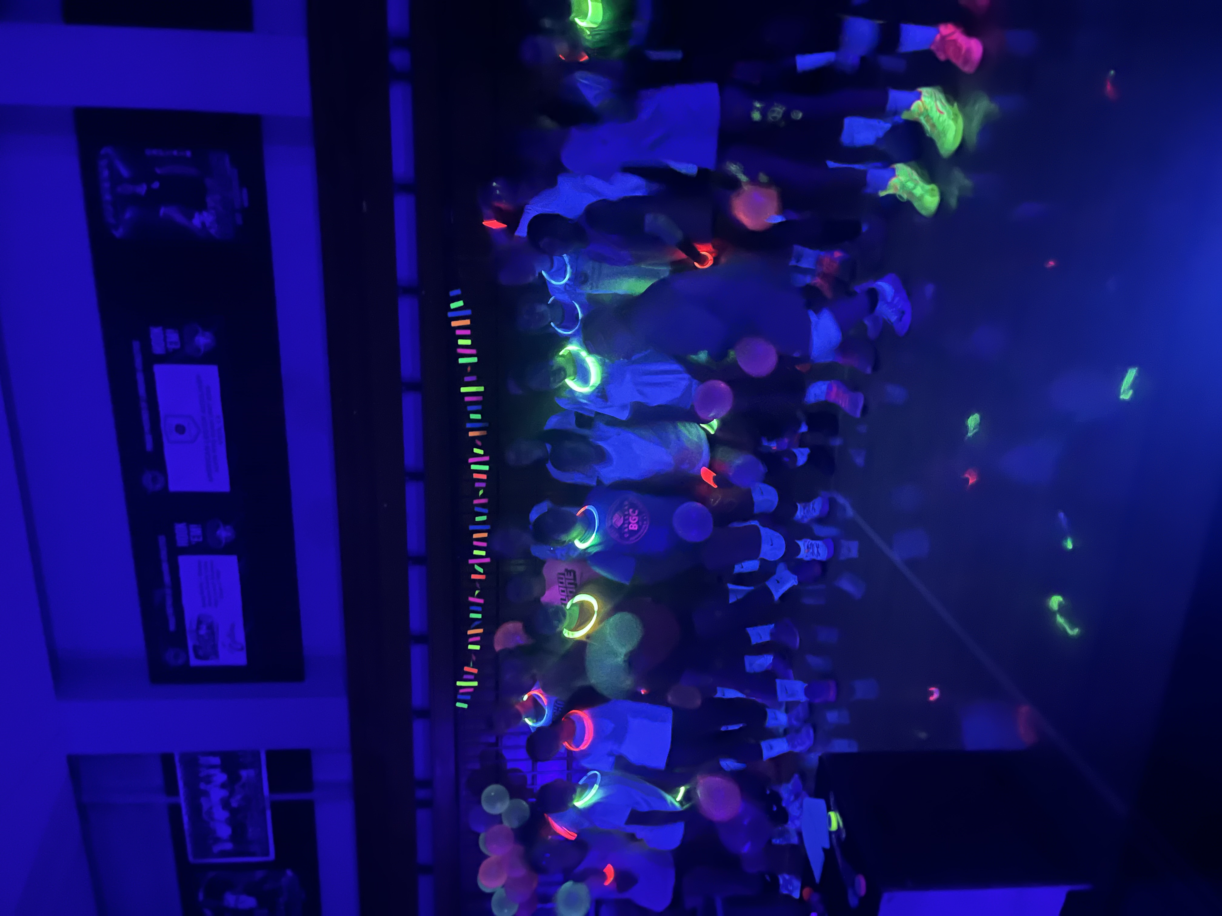 RBV volleyball players gathered during glow practice