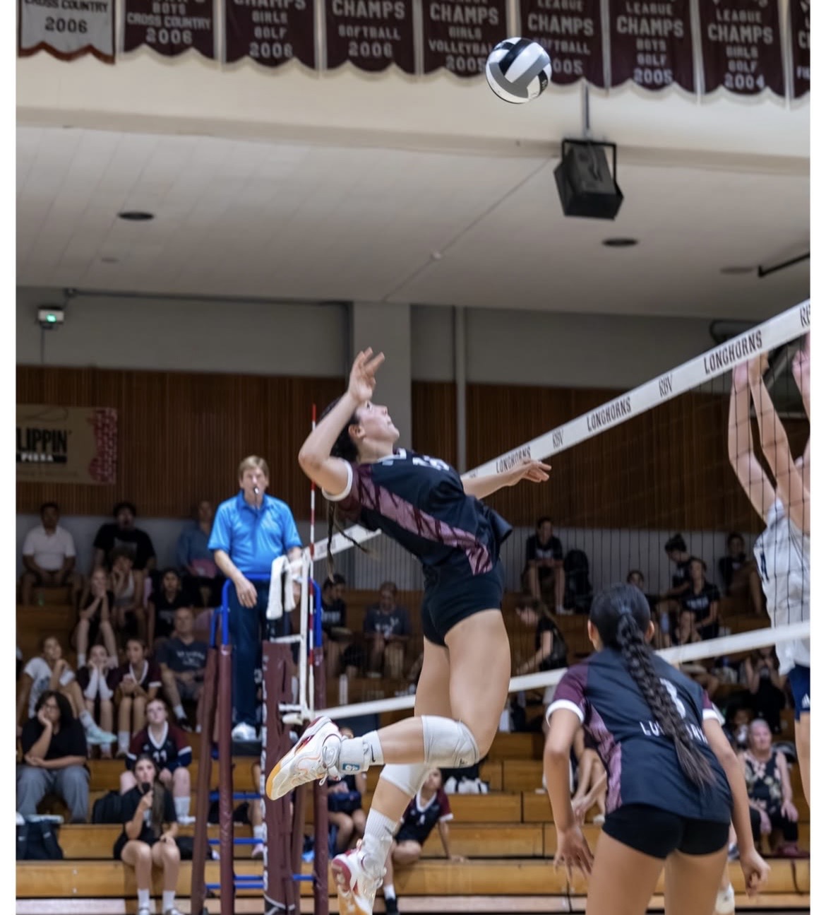 RBV varsity volleyball action during the LCC match